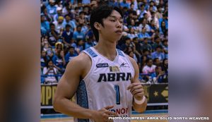 Dave Ildefonso celebrating with the 2025 MPBL MVP trophy following the Abra Solid North Weavers championship win.