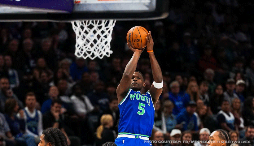 Anthony Edwards shoots over a Toronto Raptors defender during the Timberwolves' 117-94 win in Minneapolis