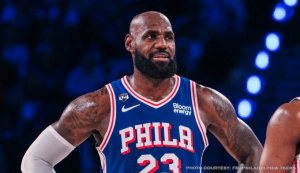 LeBron James playing center for the Philadelphia 76ers during their NBA game against the Detroit Pistons