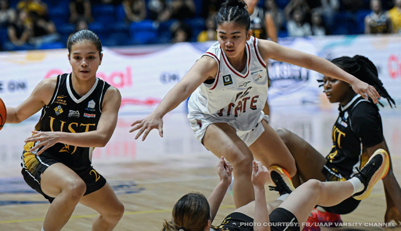UST Growling Tigresses players celebrate after completing a first-round sweep with a win over UP Fighting Maroons.